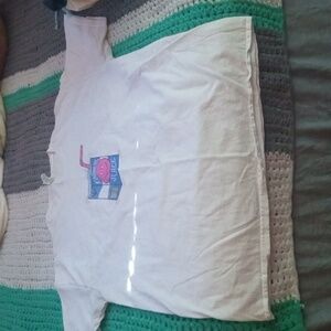 White t shirt with logo on it